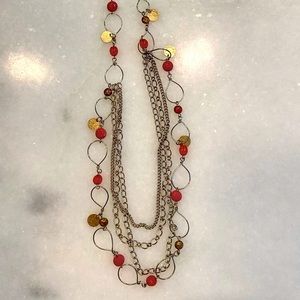 Gold color metal and red & bronze beaded necklace